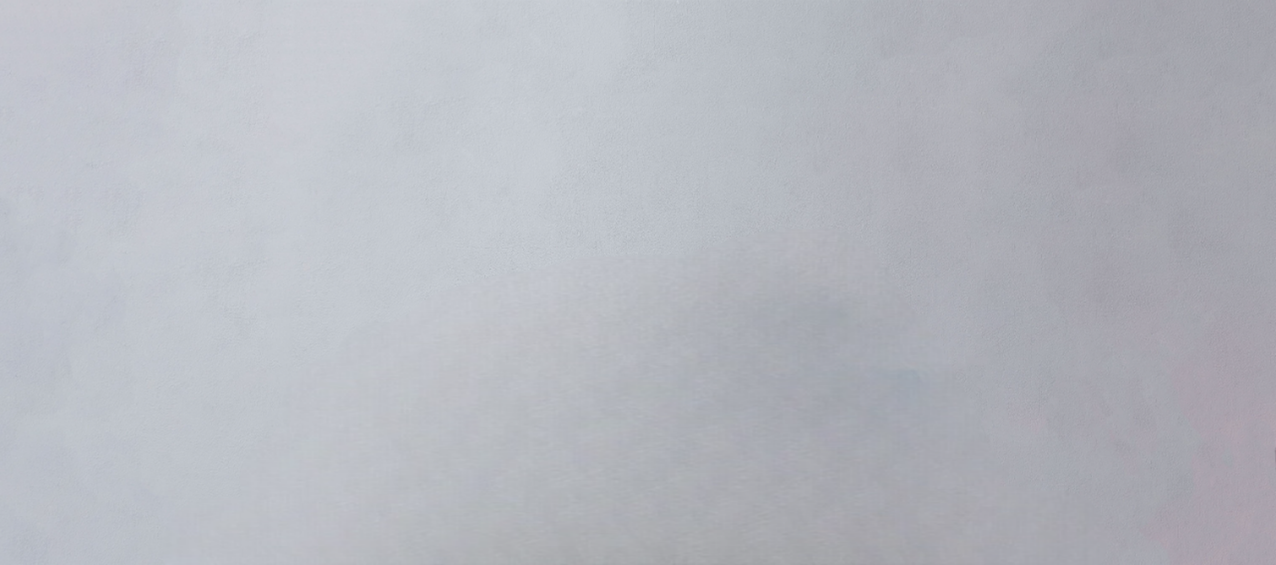 young-woman-sitting-waiting-room-wide_bg-only